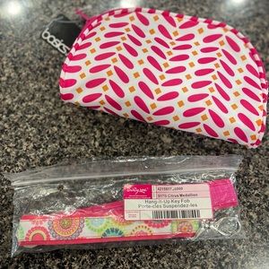 Brand new thirty one keychains and cosmetic bag.